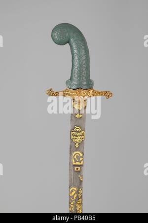 Schwert (Kilij). Kultur: Griff und Guard, Türkisch; Griff, Indische. Abmessungen: L 37 cm. (95,6 cm). Datum: Griff und Guard, 19. Jahrhundert, Griff, möglicherweise aus dem 18. Jahrhundert. Die Inschriften auf dem Schwert ruft Allah, dem Propheten Muhammad, und 'Ali. Auf die Klinge des Schwertes ist das <i> Ayat al-Kursi</i> (Thron Vers, 2: 255), ein beliebter Talisman in der ganzen islamischen Welt. Museum: Metropolitan Museum of Art, New York, USA. Stockfoto