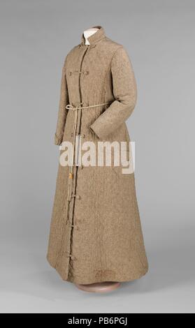 Morgenmantel. Kultur: American. Datum: 1850-59. Dieses Herrn Robe ist von Interesse für Sie ein Gefühl von Zuhause und Wärme ausstrahlt. Die mehrfarbige Futter belebt die fad Exterieur und ein Gefühl von Exotik in die Verwendung mehrerer Frosch Verschlüsse zu sehen ist und die Anwendung der Mandarin-stil kragen. Fein gearbeitete, Exterieur und Interieur sind vollständig zusammen gebaut. Museum: Metropolitan Museum of Art, New York, USA. Stockfoto