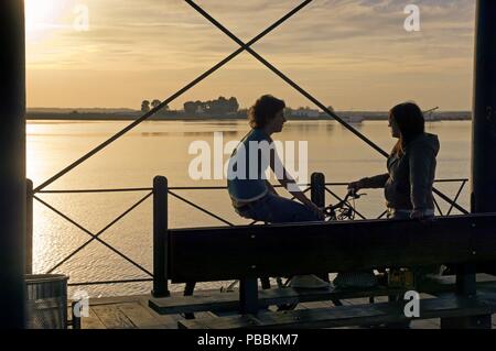 Mineral Pier auf der Odiel River bei Sonnenuntergang, Huelva, Andalusien, Spanien. Stockfoto