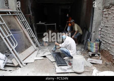 Die Arbeiter auf der Baustelle. Ho Chi Minh City. Vietnam. | Verwendung weltweit Stockfoto