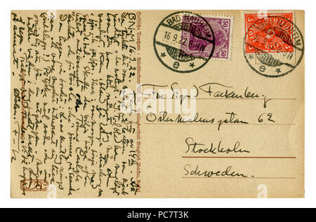 Zurück der Historischen Deutschen Postkarte. Schreiben in schwarzer Tinte aus Bad Nauheim in Stockholm, Schweden. Zwei Briefmarken. Poststempel Cancellation. 16.09.1922 Stockfoto