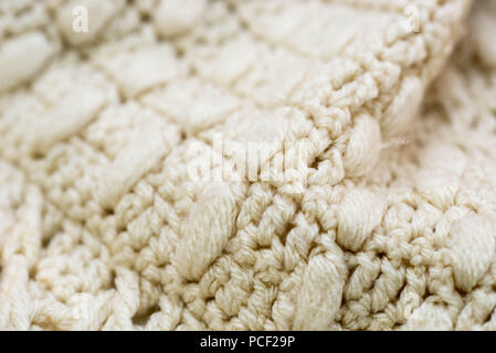 Beige Farbe winkte Strickwaren Textur Hintergrund Makro Stockfoto