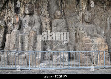 Die steinmetzarbeiten in der Longmen Grotten in der Provinz Henan in China. Stockfoto