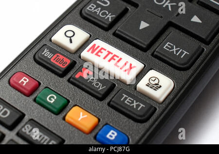 Netflix und youtube Buttons im Fernsehen TV mit Fernbedienung und Controller Stockfoto