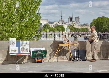 Künstler auf einer Brücke Malerei & Verkauf von Bildern der Die seine in Paris Stockfoto