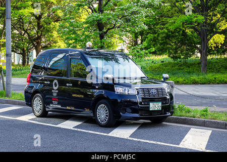 TOKYO, Japan - 20. APRIL 2018: Neues Modell der japanischen Taxi genannt JPN Taxi bereitet sich auf die Olympischen Tourismus Boom 2020 mit zugänglichen Kabinen und Internationale Stockfoto