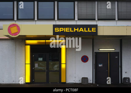 Die neon-beleuchtete Außenfassade und Eingangstür eines Casino oder Spielzimmer Stockfoto