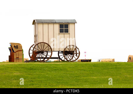 Alte Kutsche, Cloud Stimmung, Butjadingen, Niedersachsen, Deutschland, Europa Stockfoto
