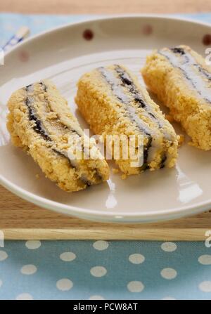 Koreanisches Essen schwarzer Sesam Pulver Soja Klebreis Kuchen Stockfoto