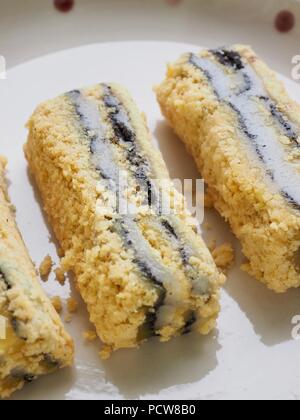 Koreanisches Essen schwarzer Sesam Pulver Soja Klebreis Kuchen Stockfoto