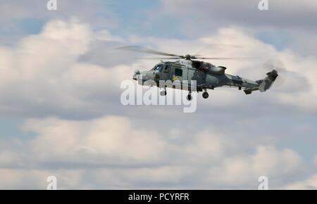 Royal Navy Wildcat HMA.2-Maritme Kampfhubschrauber ab 815 Naval Air Squadron Ankunft in RAF Fairford für die 2018 Royal International Air Tattoo Stockfoto