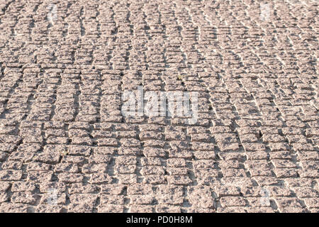 Zusammenfassung Hintergrund der alten Kopfsteinpflaster close-up. Stockfoto