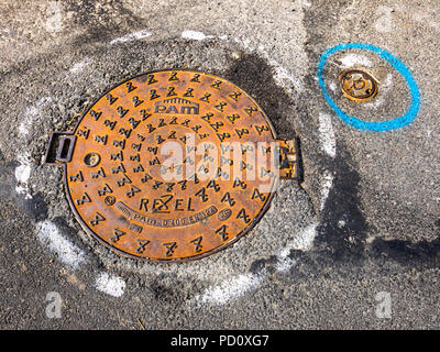 Rusty mletal Manhold, Frankreich. Stockfoto