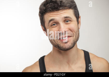 Freundlich unrasierten Mann mit positiven Ausdruck. Close-up Portrait. Kopieren Sie Platz Stockfoto