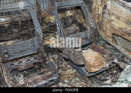 Innenraum eines ausgebrannten Auto ideal für Versicherungs- oder Kriminalität und Vandalismus Konzepte Stockfoto