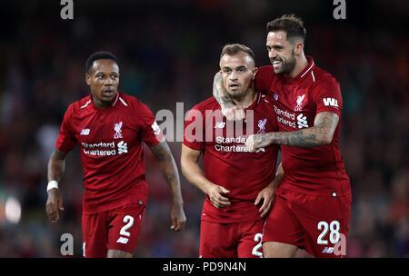 Liverpool (links-rechts) Fabinho, Xherdan Shaqiri, und Danny Ings feiern Daniel Sturridge (nicht abgebildet) dritten Ziel seiner Seite des Spiels zählen während der pre-Season Match in Liverpool, Liverpool. Stockfoto