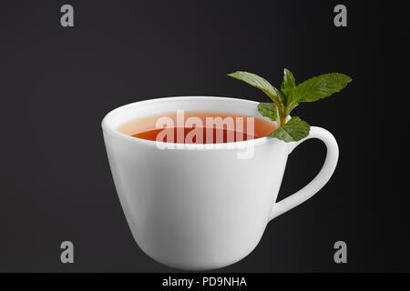 Tasse Tee mit Minze Stockfoto