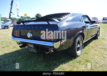 A 1966 Ford Mustang bis auf Torbay Steam Fair, Churston, Devon, England, UK geparkt Stockfoto