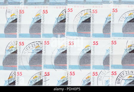 Alte Deutsche gestempelten Briefmarken in einen Stempel album Stockfoto