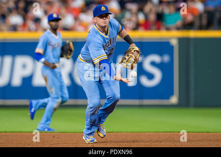 August 10, 2018: Seattle Mariners erste Basisspieler Ryon Healy (27) wirft den Ball in Richtung zuerst eine während einer Major League Baseball Spiel zwischen den Houston Astros und die Seattle Mariners auf 1970er Nacht im Minute Maid Park in Houston, TX. Die Seemänner gewann das Spiel 5 zu 2. Trask Smith/CSM Stockfoto