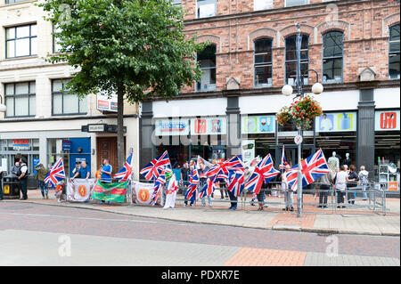 Belfast, Nordirland, Großbritannien, 11. August 2018. Großbritannien ein anti-internierung Parade von republikanischen Dissidenten organisiert hat nach Belfast City Centre zum ersten Mal marschierten. Die Anti-Internment Liga sagte Es ist März war "die fortgesetzte Verwendung der Internierung durch die Untersuchungshaft" und markieren Sie "Fälle der Internierung einschließlich derjenigen über den Widerruf der Lizenz eingesperrt widersetzen, durch Untersuchungshaft, über Justizirrtümer und durch 'Gardasee glauben Beweise''. Quelle: John Rymer/Alamy leben Nachrichten Stockfoto