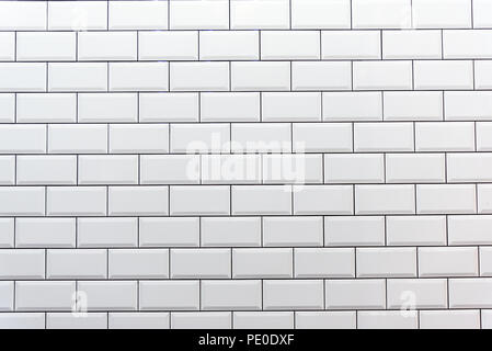 Hintergrund von einem sauberen weißen Fliesen Wand Stockfoto