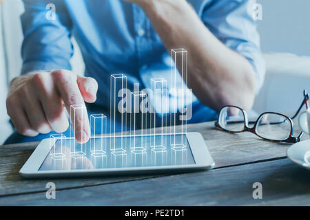 Unternehmer mit Hilfe digitaler Technologie für Business Start-up, 3D-Säulendiagramm Stockfoto