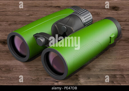 Moderne grüne Fernglas auf den hölzernen Hintergrund. 3D-Rendering Stockfoto