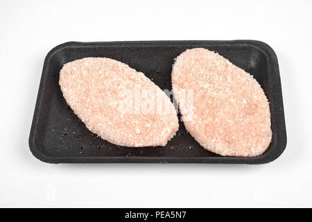 Rohes Hähnchen schnitzel im Paket. Auf einem weißen Hintergrund. Stockfoto