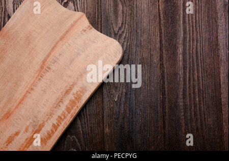 Holz auf Holz- dunkle Desktop. Die Aussicht von oben. Stockfoto