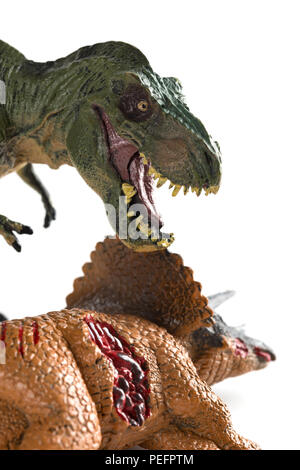 Mit einem tyrannosaurus Triceratops Körper in der Nähe auf weißem Hintergrund vertikalen Zusammensetzung Stockfoto