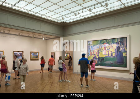 Besucher schauen Sie über Georges Seurat ist ein Sonntag auf der Insel La Grande Jatte bei Kunst Institut von Chicago, Chicago, Illinois, USA Stockfoto