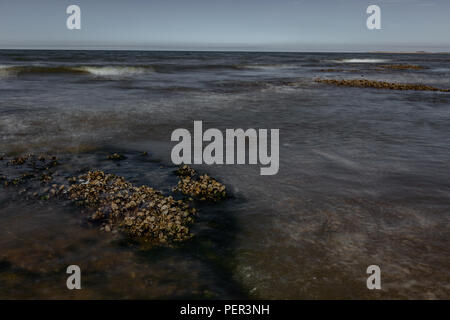 Flut in Old Hunstanton Klippen Stockfoto