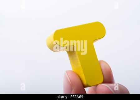 Hand schreiben cube T aus Holz Stockfoto