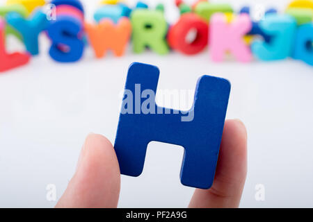 Schreiben cube von H Alphabet aus Holz Stockfoto