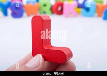 Hand schreiben cube L aus Holz Stockfoto