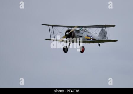 Gloster Gladiator der letzten bi-plane Kämpfer von der Royal Air Force verwendet, Fliegen bei shuttleworth's 2018 Flying Proms Stockfoto