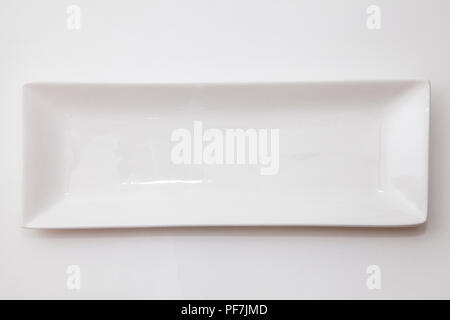 Schlank und weiß Keramik Teller Stockfoto