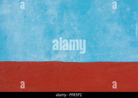 Blauen und Roten Zement Wand Textur Stockfoto