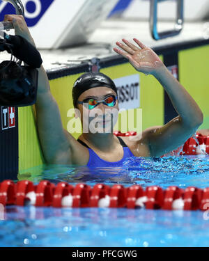 Jakarta, Indonesien. 21 Aug, 2018. Ikee Rikako von Japan reagiert, nachdem der Frauen 100 m Schmetterling endgültig vom Schwimmen im 18. asiatischen Spiele in Jakarta, Indonesien, Nov. 21, 2018. Ikee gewann die Goldmedaille. Credit: Fei Maohua/Xinhua/Alamy leben Nachrichten Stockfoto