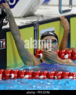 Jakarta, Indonesien. 21 Aug, 2018. Ikee Rikako von Japan reagiert, nachdem der Frauen 100 m Schmetterling endgültig vom Schwimmen im 18. asiatischen Spiele in Jakarta, Indonesien, Nov. 21, 2018. Ikee gewann die Goldmedaille. Credit: Fei Maohua/Xinhua/Alamy leben Nachrichten Stockfoto