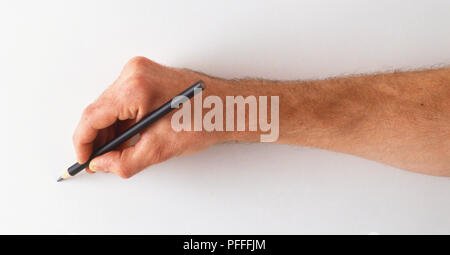 Hand mit Bleistift für Zeichnung balanciert. Stockfoto