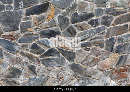 Graue Steinmauer, Baumaterial Stockfoto