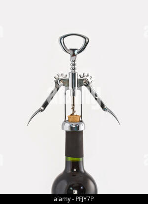 Korkenzieher rot, Wein, Flasche, Nahaufnahme Stockfoto