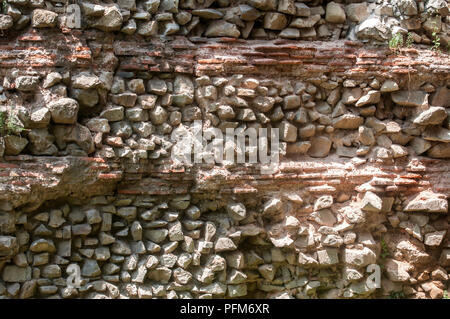 Antike römische Stein und keramischen Fliesen Wand closeup als Hintergrund Stockfoto