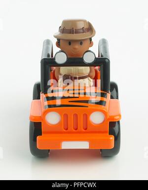 Spielzeug safari Auto mit Mann und Hut, close-up Stockfoto