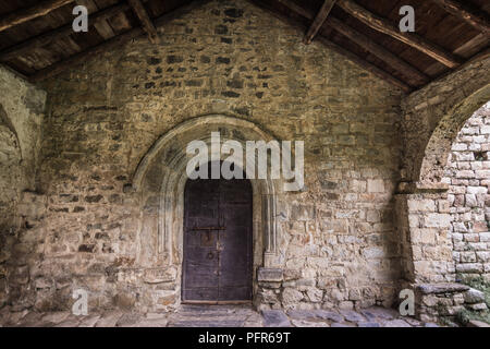 Alte Holztür von Sant Feliu Kirche in Zahara De Los Atunes, Katalonien, Spanien. Romanisch katalanische Romanische Kirchen im Vall de Boi erklärt werden und sich eine Stockfoto