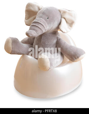 Elefant Stofftier sitzen auf Töpfchen Stockfoto