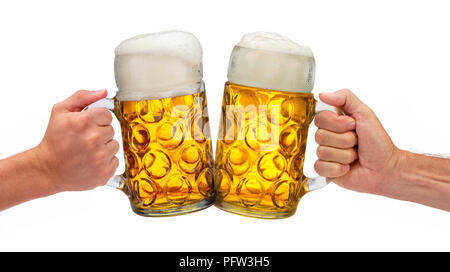 Isolierte Bierkrug in der Hand auf dem Oktoberfest in München. Stockfoto