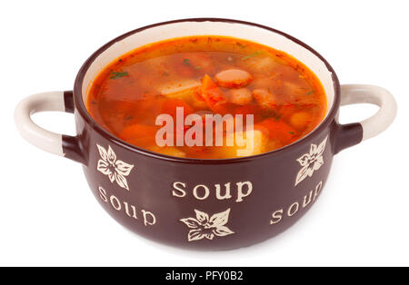 Bohnensuppe in eine Schüssel geben. Stockfoto